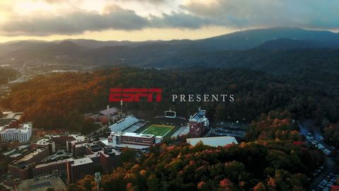 College football stadium at sunset